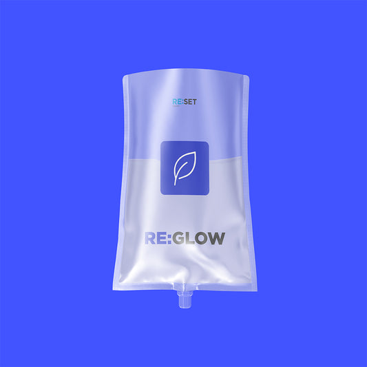 Purple IV bag with 'RE:GLOW' branding on a purple background