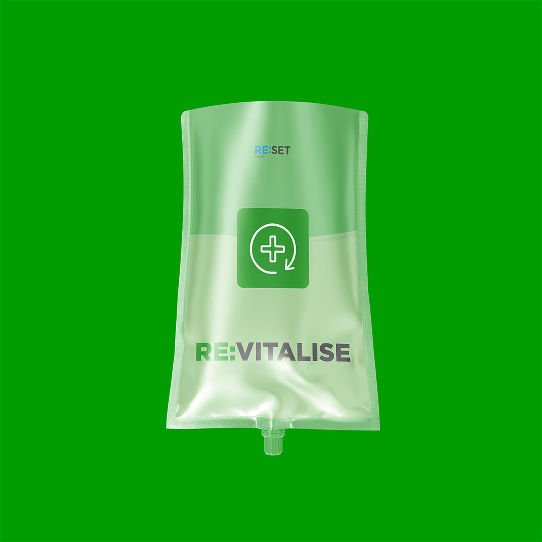 Clear plastic bag with 'REVITALISE' branding on a green background